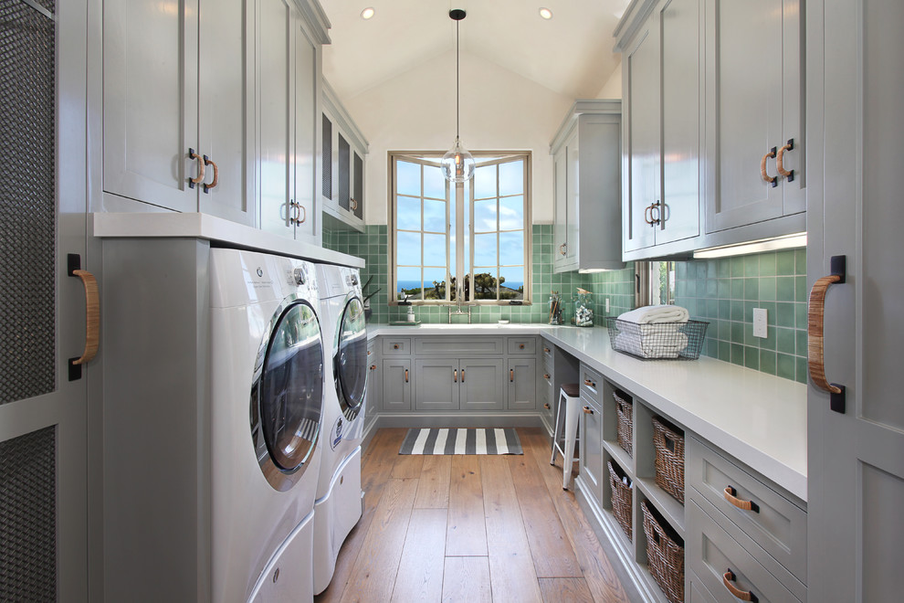 Inspiration for a mediterranean laundry room in Orange County.