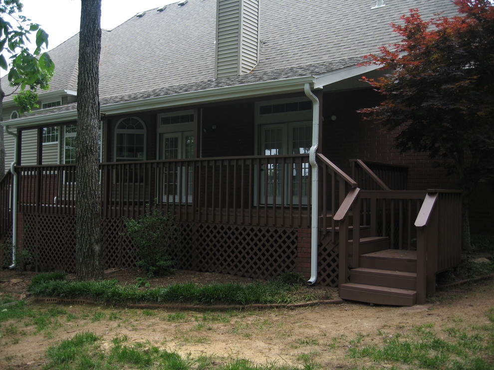 Deck - mid-sized craftsman backyard deck idea with a roof extension