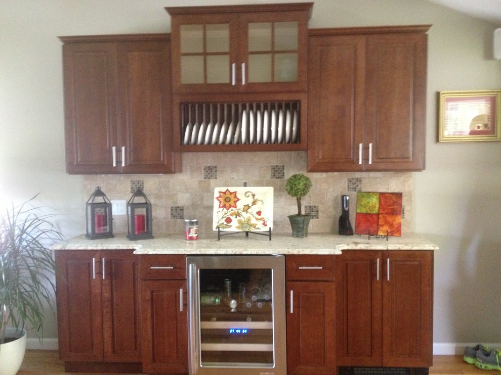 Eat-in kitchen - mid-sized eclectic l-shaped medium tone wood floor and brown floor eat-in kitchen idea in Bridgeport with an undermount sink, shaker cabinets, dark wood cabinets, granite countertops, beige backsplash, ceramic backsplash, stainless steel appliances and an island