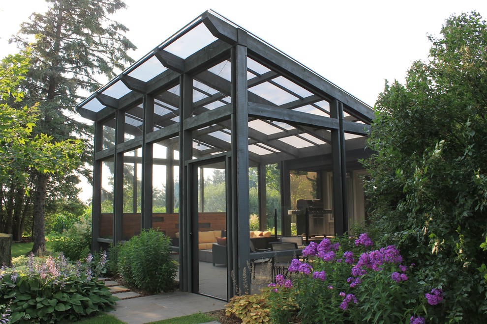 This is an example of a mid-sized contemporary detached greenhouse in Toronto.
