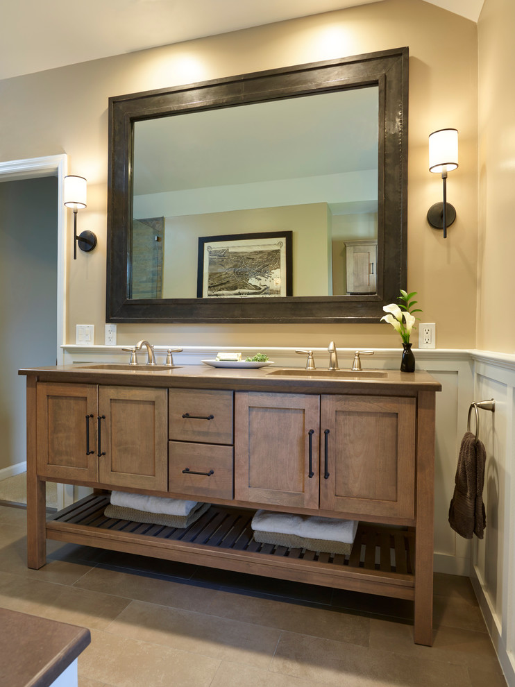 Doorless shower - transitional master gray tile porcelain tile doorless shower idea in New York with furniture-like cabinets, beige cabinets, granite countertops and beige walls