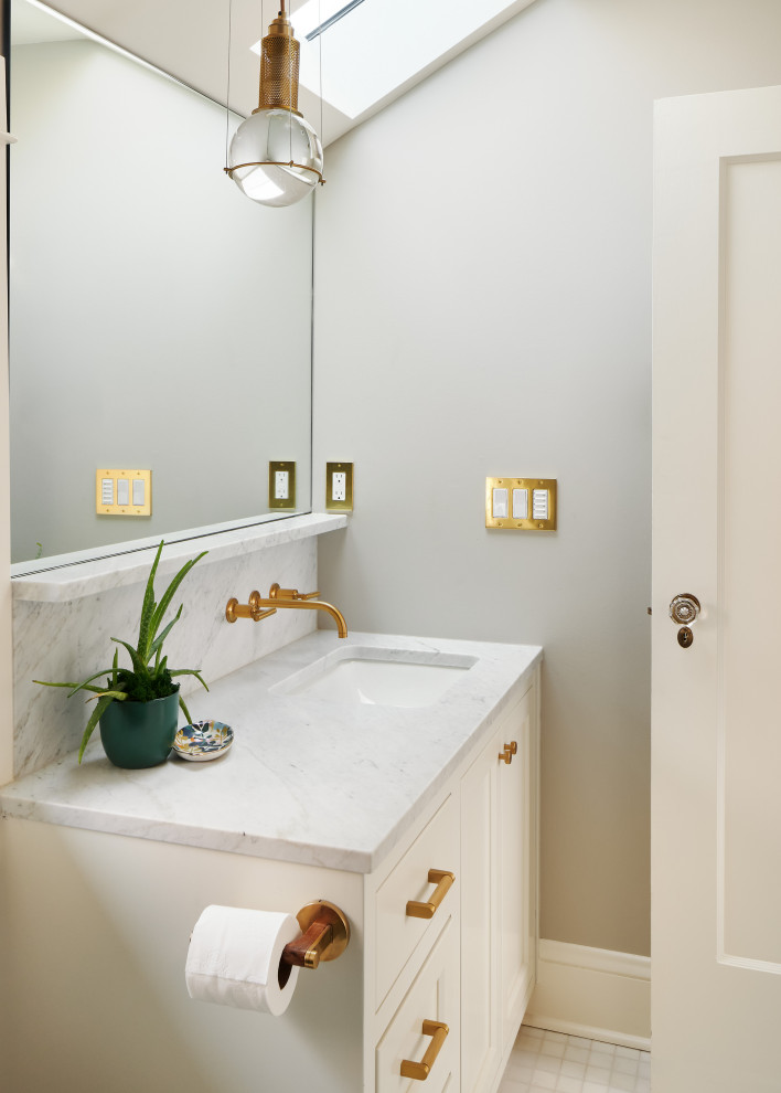Inspiration for a small green tile and ceramic tile marble floor, white floor, single-sink and vaulted ceiling bathroom remodel in Portland with shaker cabinets, white cabinets, a one-piece toilet, white walls, an undermount sink, marble countertops, white countertops and a built-in vanity