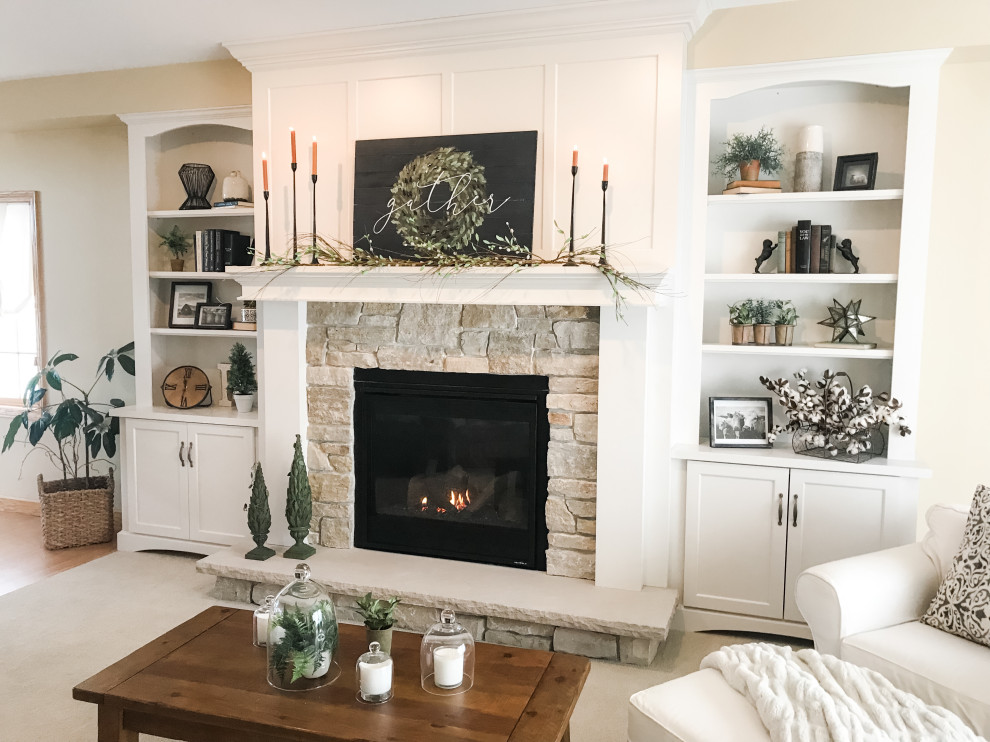 Inspiration for a traditional open concept living room with a standard fireplace and a stone fireplace surround.