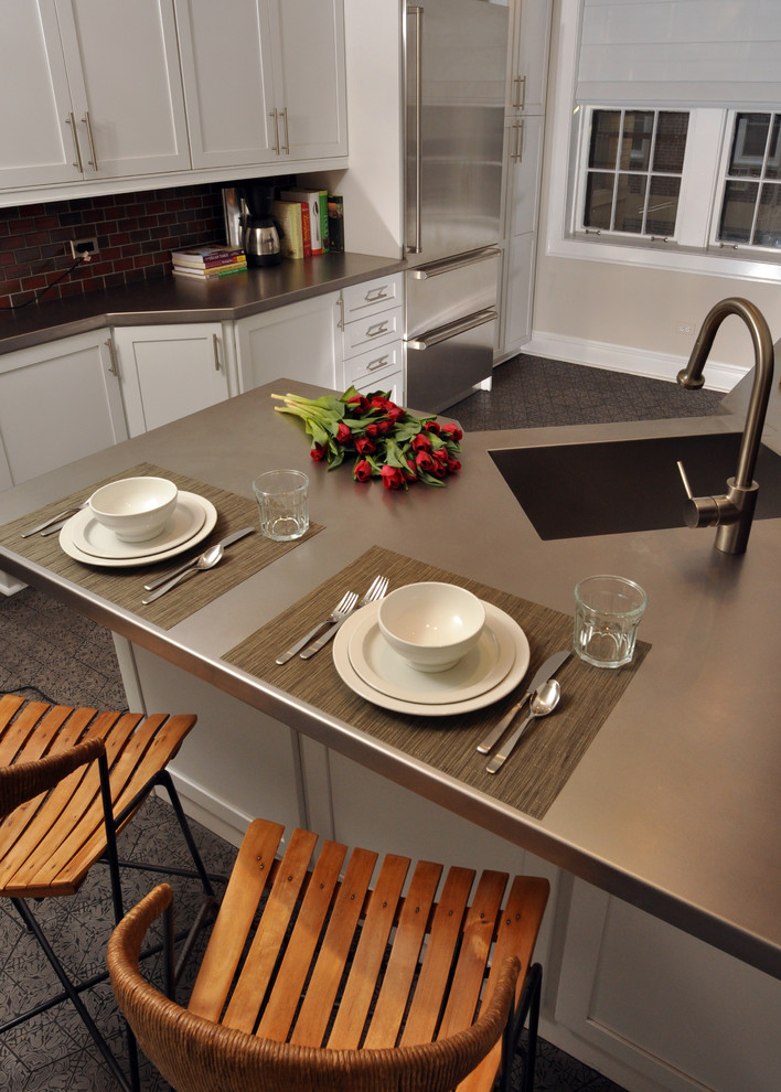 Example of a mid-sized trendy home design design in Chicago