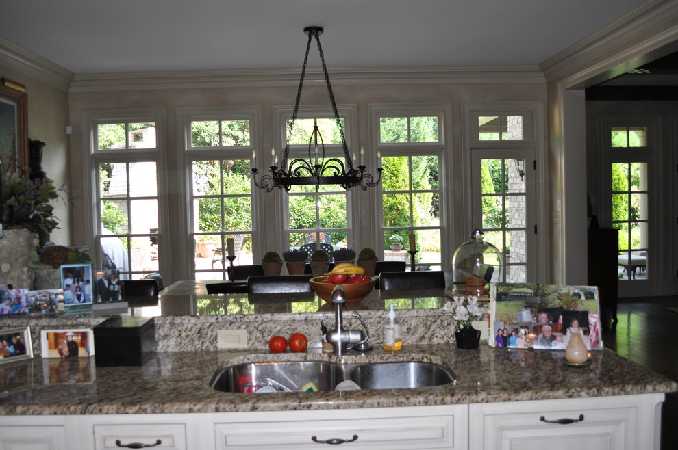 Example of a transitional kitchen design in Raleigh