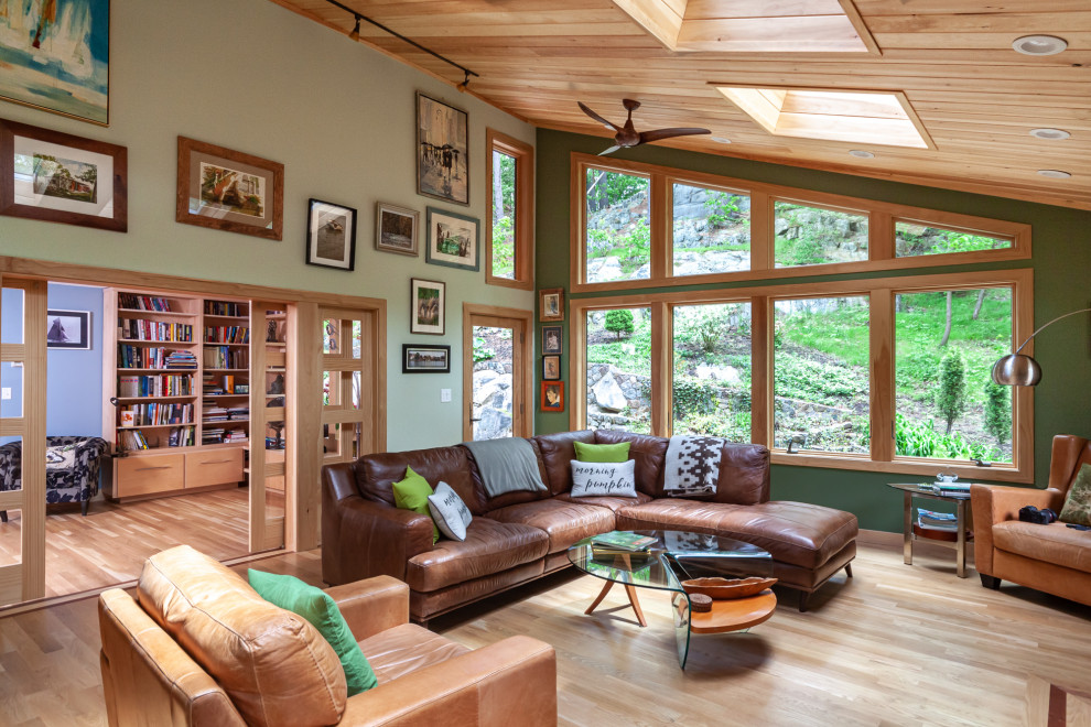 Example of a mountain style sunroom design in Boston