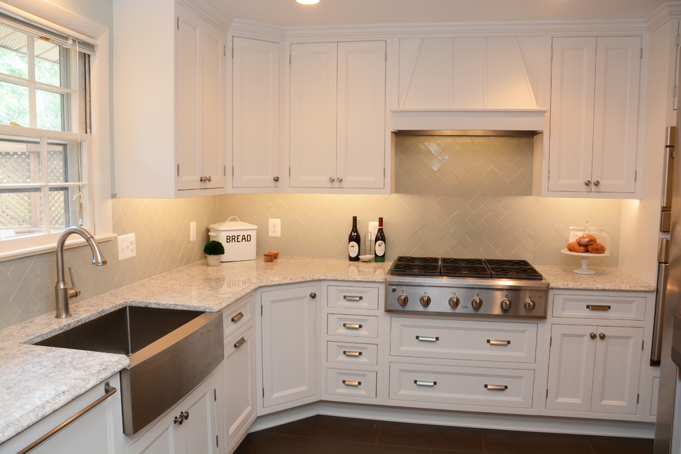 This is an example of a mid-sized traditional l-shaped separate kitchen in DC Metro with a farmhouse sink, recessed-panel cabinets, white cabinets, quartz benchtops, green splashback, porcelain splashback, stainless steel appliances, ceramic floors and no island.