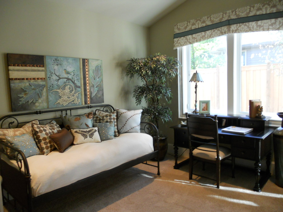 Inspiration for a mid-sized traditional guest bedroom in Portland with blue walls and carpet.