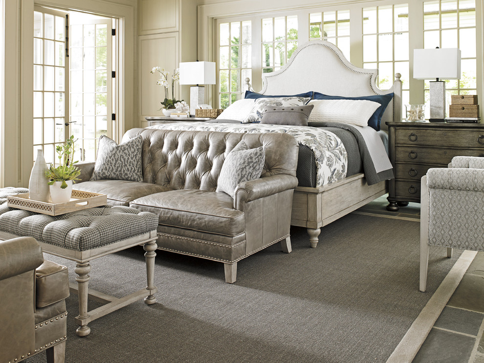 Design ideas for a large traditional master bedroom in Charleston with white walls, slate floors and no fireplace.