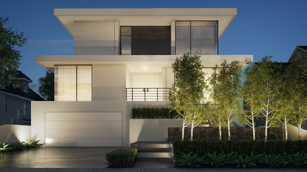 Design ideas for a large modern two-storey stucco white exterior in Melbourne.
