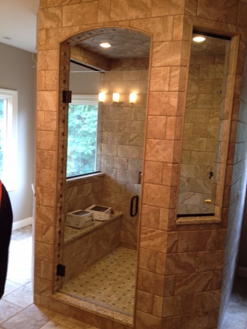 Alcove shower - large transitional master beige tile and ceramic tile ceramic tile alcove shower idea with beige walls and granite countertops