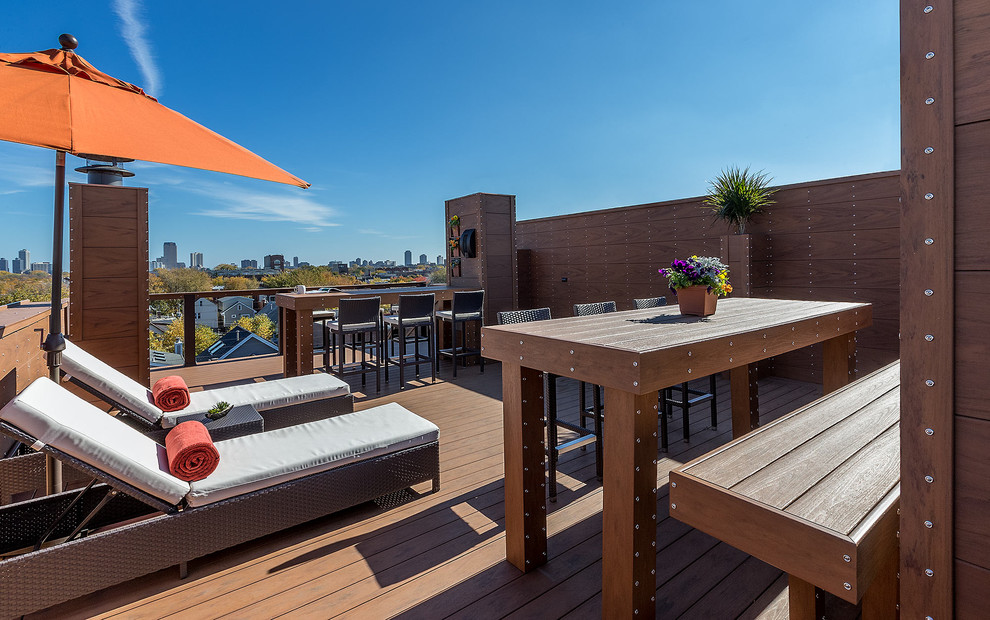 Large contemporary rooftop deck in Chicago with no cover and a container garden.