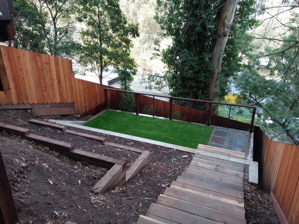 A Steeply Sloped Backyard is Transformed Into a Multi-Level Entertainment Venue