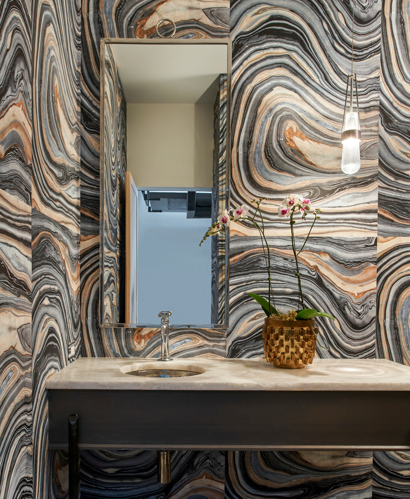Mid-sized transitional powder room in Chicago with flat-panel cabinets, grey cabinets, quartzite benchtops, multi-coloured tile, beige walls, an undermount sink and beige benchtops.