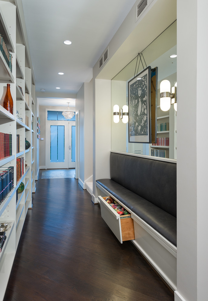 Contemporary hallway in DC Metro with white walls and dark hardwood floors.