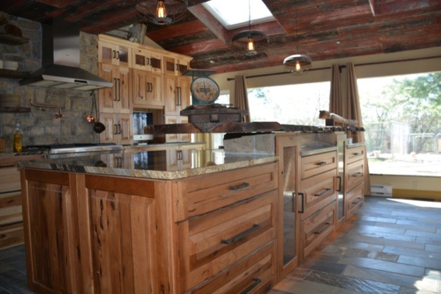 Example of a mountain style kitchen design in Dallas