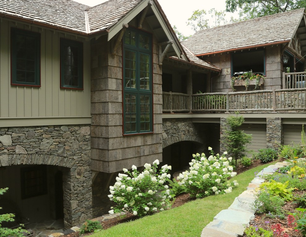Traditional exterior in Charlotte with stone veneer.