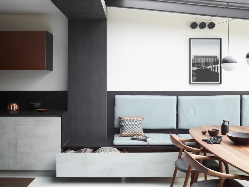 This is an example of a contemporary dining room in London.