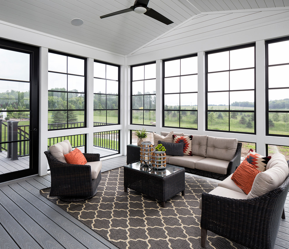 Transitional sunroom in Minneapolis with dark hardwood floors, no fireplace and a standard ceiling.