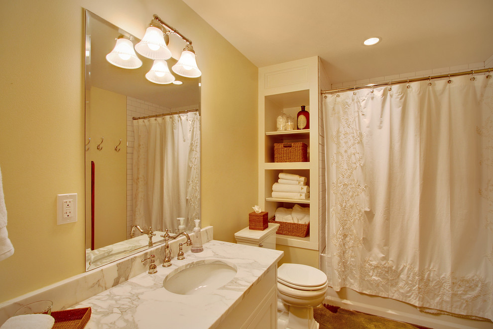 Design ideas for a traditional bathroom in Seattle with an undermount sink and a two-piece toilet.