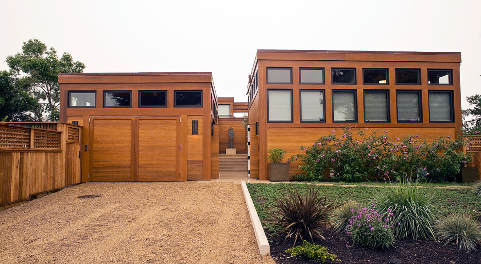 Photo of a beach style exterior in San Francisco with wood siding.