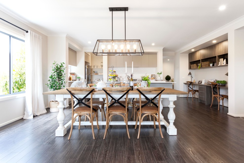 Inspiration for a traditional open plan dining in Melbourne with beige walls, dark hardwood floors and brown floor.