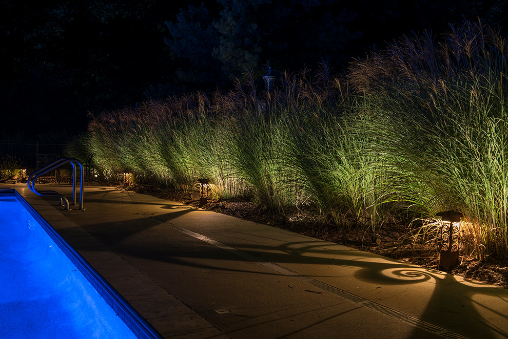 Mid-sized backyard concrete and rectangular pool photo