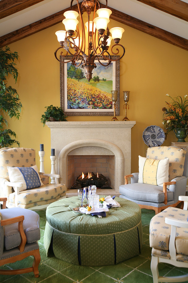 Small country formal enclosed living room in Dallas with yellow walls, carpet, a standard fireplace, a stone fireplace surround, no tv and green floor.
