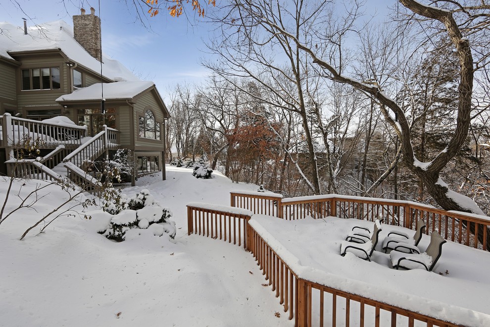 Photo of an expansive traditional backyard deck in Minneapolis.