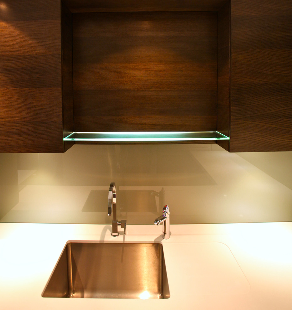 Example of a transitional u-shaped dark wood floor open concept kitchen design in Perth with an undermount sink, flat-panel cabinets, dark wood cabinets, granite countertops, glass sheet backsplash and no island