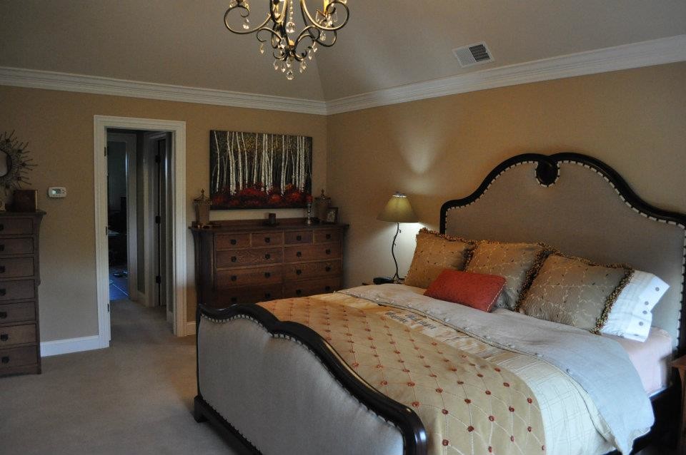 Example of a transitional bedroom design in Chicago