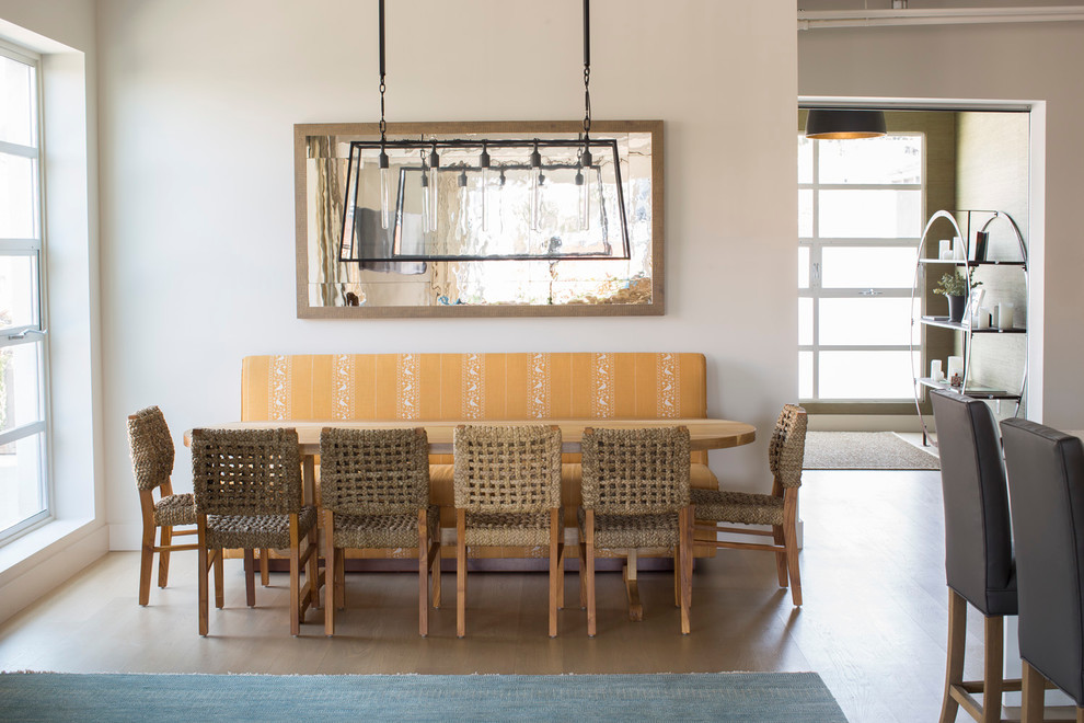 Example of a transitional dining room design in Orange County