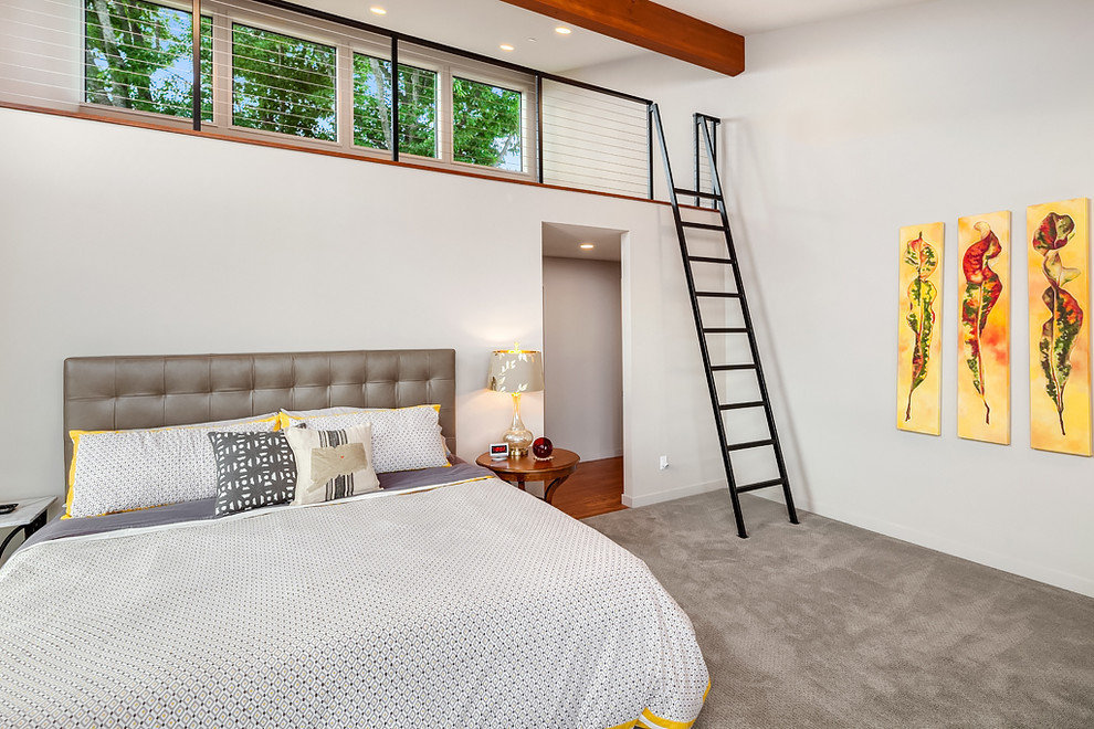 Design ideas for a transitional bedroom in Seattle with white walls and carpet.