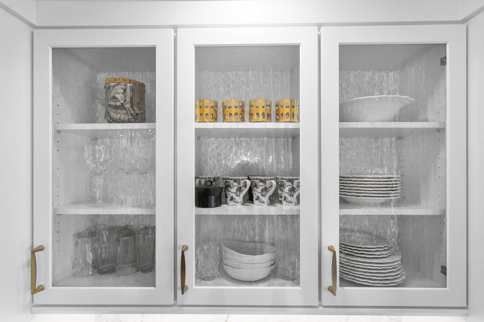 Example of a transitional home design design in Boston
