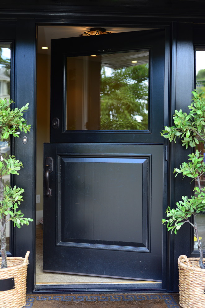 This is an example of a traditional entryway in Seattle with a dutch front door.