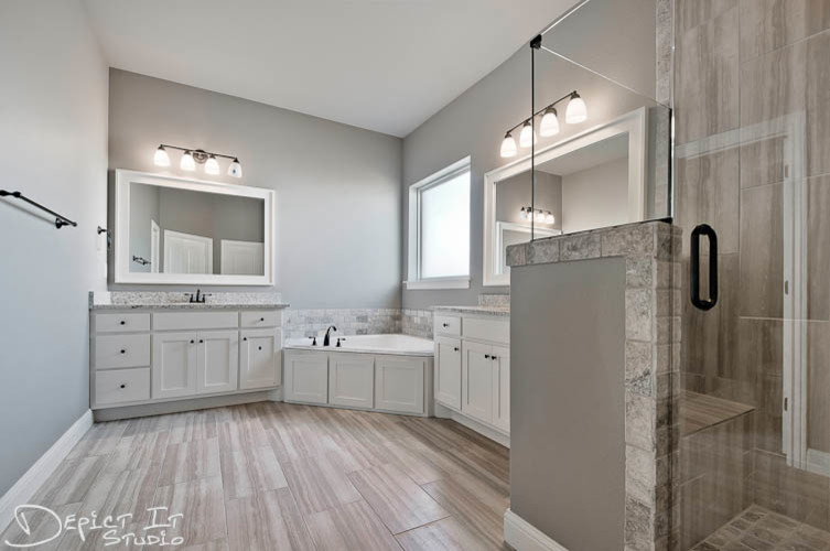 This is an example of a large contemporary master bathroom in Other with recessed-panel cabinets, white cabinets, a corner tub, an alcove shower, a two-piece toilet, multi-coloured tile, porcelain tile, grey walls, porcelain floors, an undermount sink and granite benchtops.