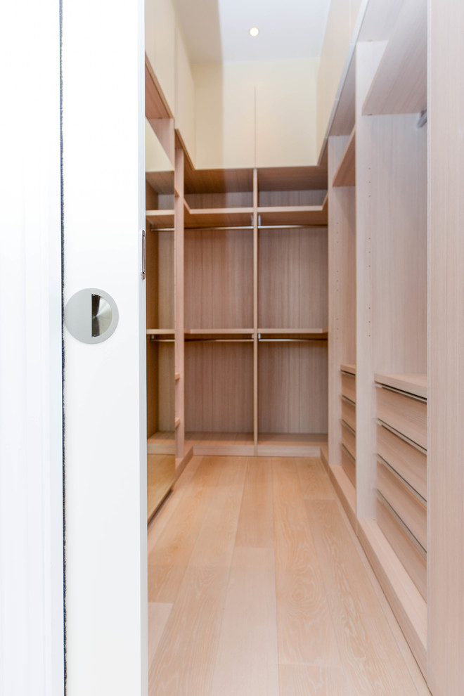 Example of a trendy closet design in London