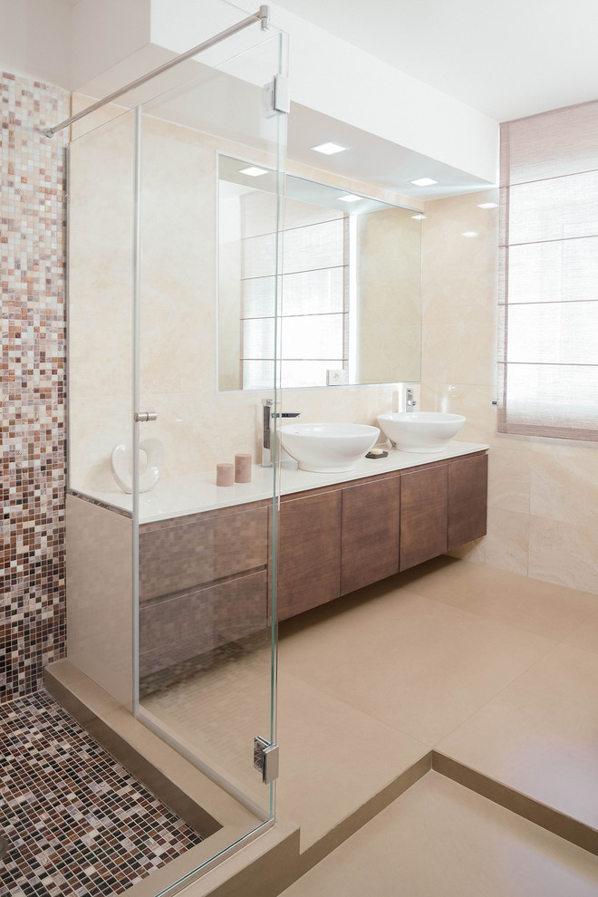 Inspiration for a contemporary 3/4 bathroom in Naples with flat-panel cabinets, medium wood cabinets, a curbless shower, beige tile, porcelain tile, beige walls, porcelain floors, a vessel sink and engineered quartz benchtops.