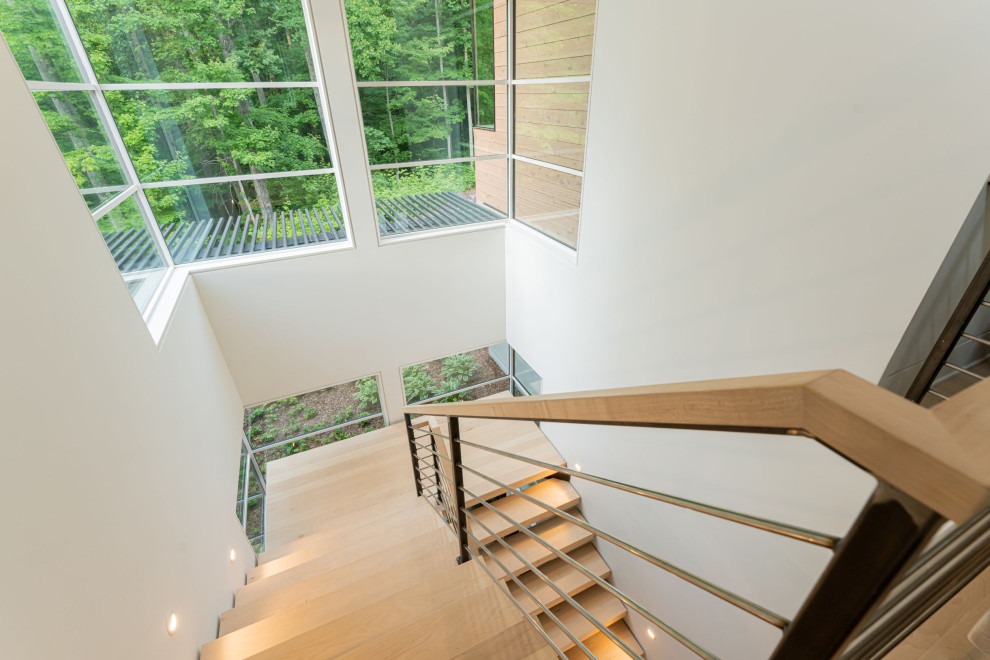 Medium sized modern staircase in Other.
