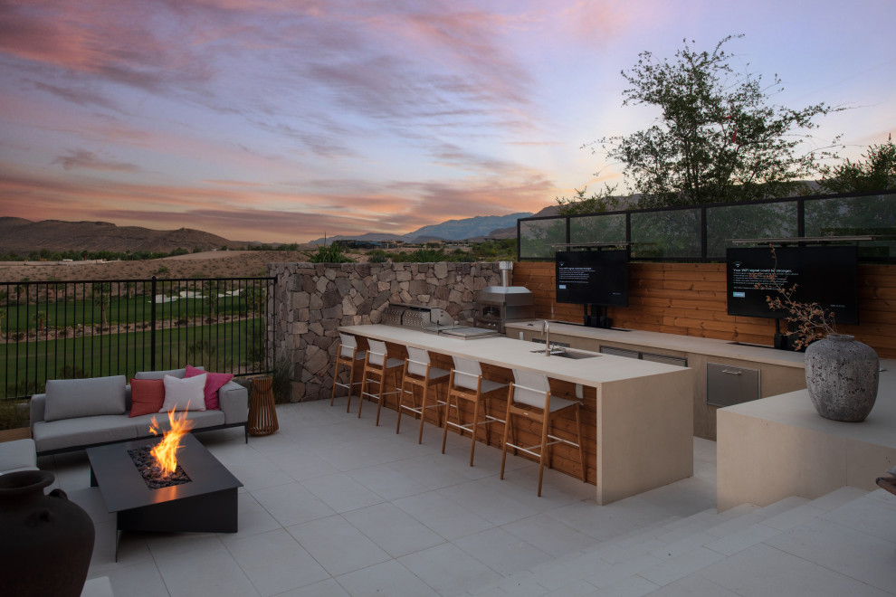 Contemporary patio in Las Vegas with a bbq area.