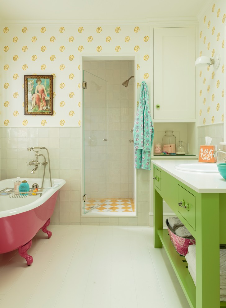 This is an example of a mid-sized beach style kids bathroom in Los Angeles with a drop-in sink, green cabinets, engineered quartz benchtops, a claw-foot tub, ceramic tile, multi-coloured walls, painted wood floors and open cabinets.