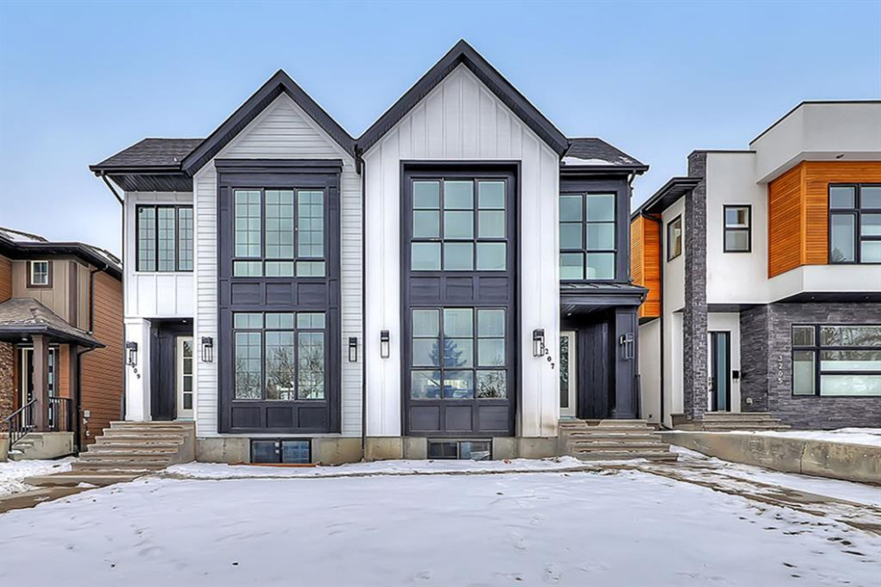 Example of a transitional home design design in Calgary