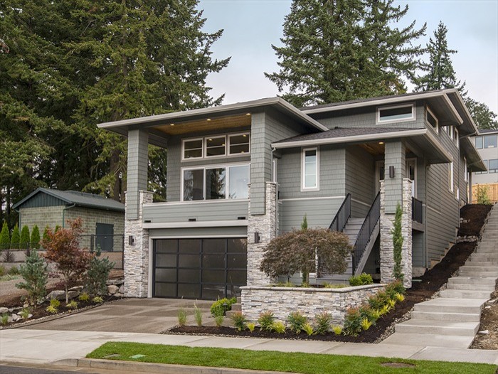 Design ideas for a large modern three-storey exterior in Portland.