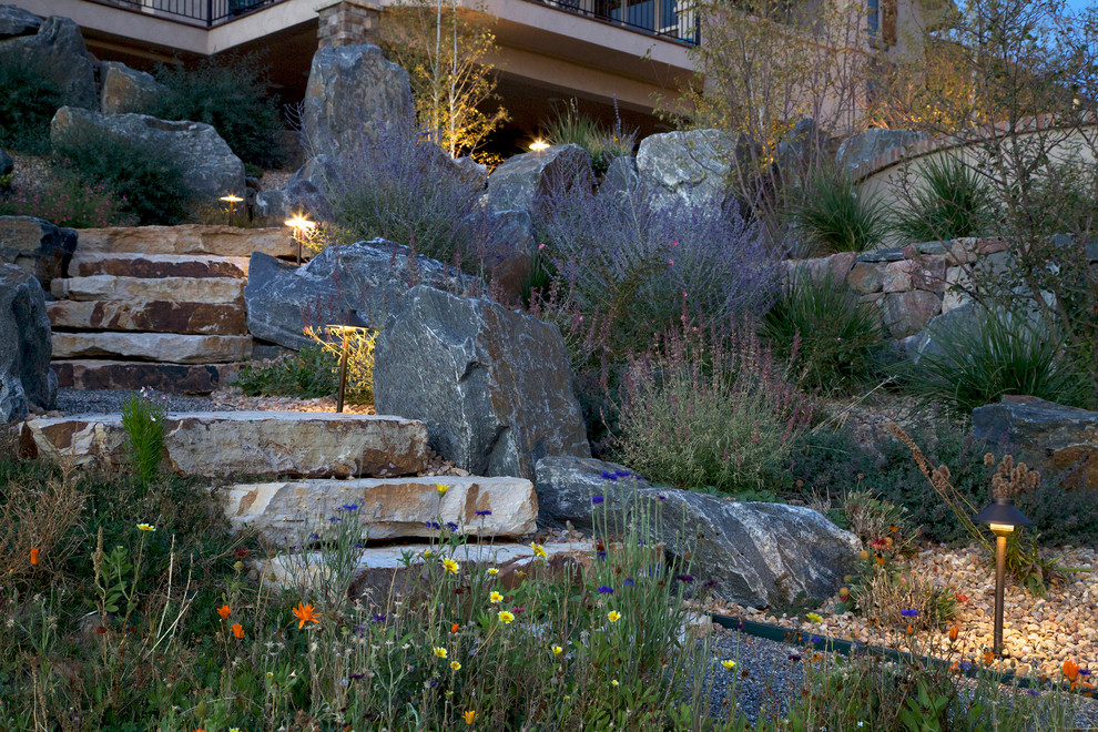 This is an example of a traditional sloped garden in Denver.