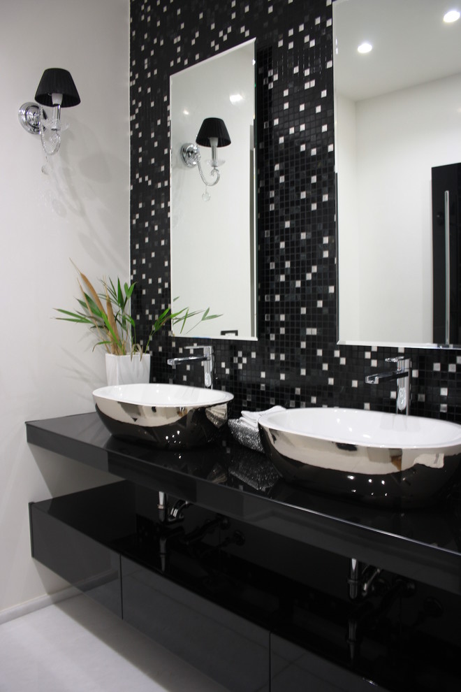 This is an example of a mid-sized modern 3/4 bathroom in Other with beaded inset cabinets, black cabinets, a drop-in tub, an alcove shower, a wall-mount toilet, beige tile, mosaic tile, beige walls, marble floors, a vessel sink, laminate benchtops, white floor, an open shower, black benchtops, a niche, a double vanity, a floating vanity and recessed.