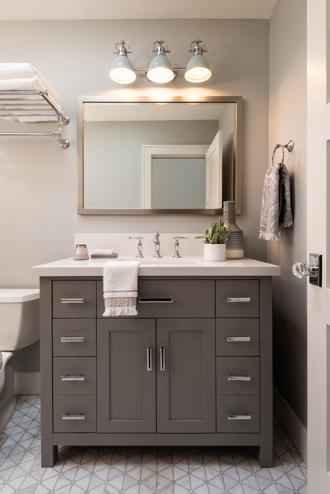 Inspiration for a small traditional kids bathroom in San Diego with shaker cabinets, grey cabinets, an alcove tub, a shower/bathtub combo, white tile, subway tile, grey walls, mosaic tile floors, an undermount sink, engineered quartz benchtops, white floor, a shower curtain and white benchtops.