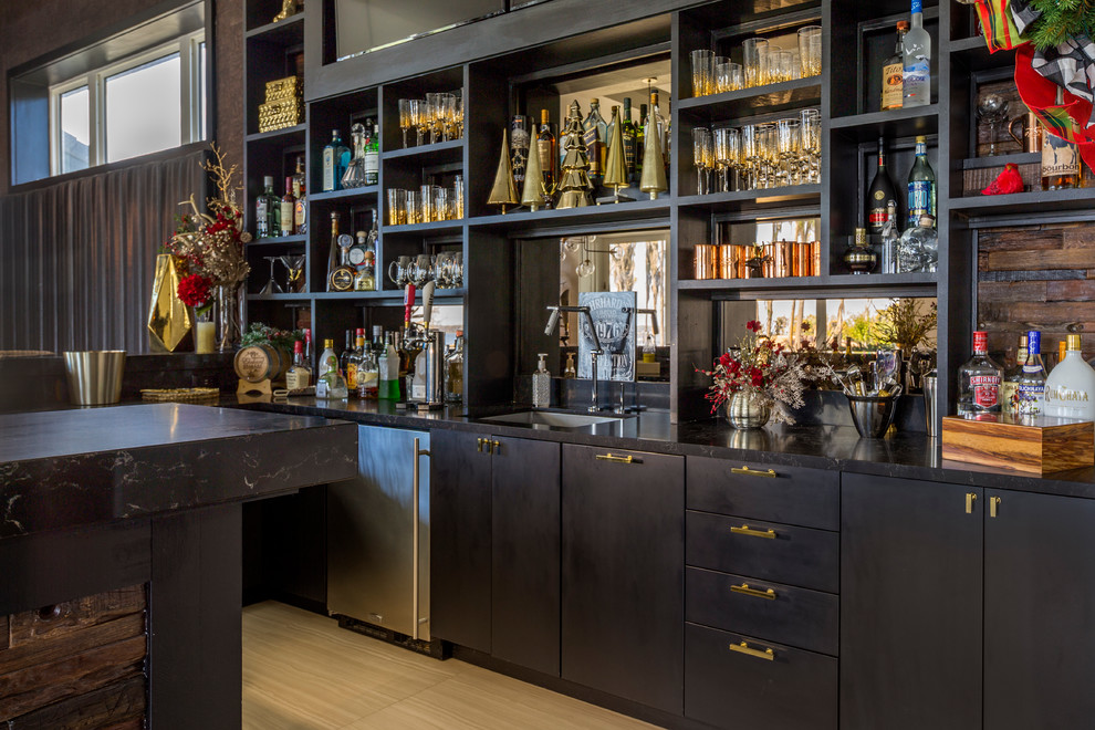 This is an example of a large contemporary l-shaped wet bar in Orlando with an undermount sink, flat-panel cabinets, black cabinets, granite benchtops, beige splashback and timber splashback.