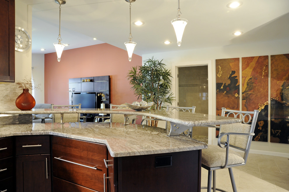 Eat-in kitchen - large transitional u-shaped ceramic tile and beige floor eat-in kitchen idea with a double-bowl sink, shaker cabinets, dark wood cabinets, granite countertops, beige backsplash, mosaic tile backsplash, stainless steel appliances and a peninsula
