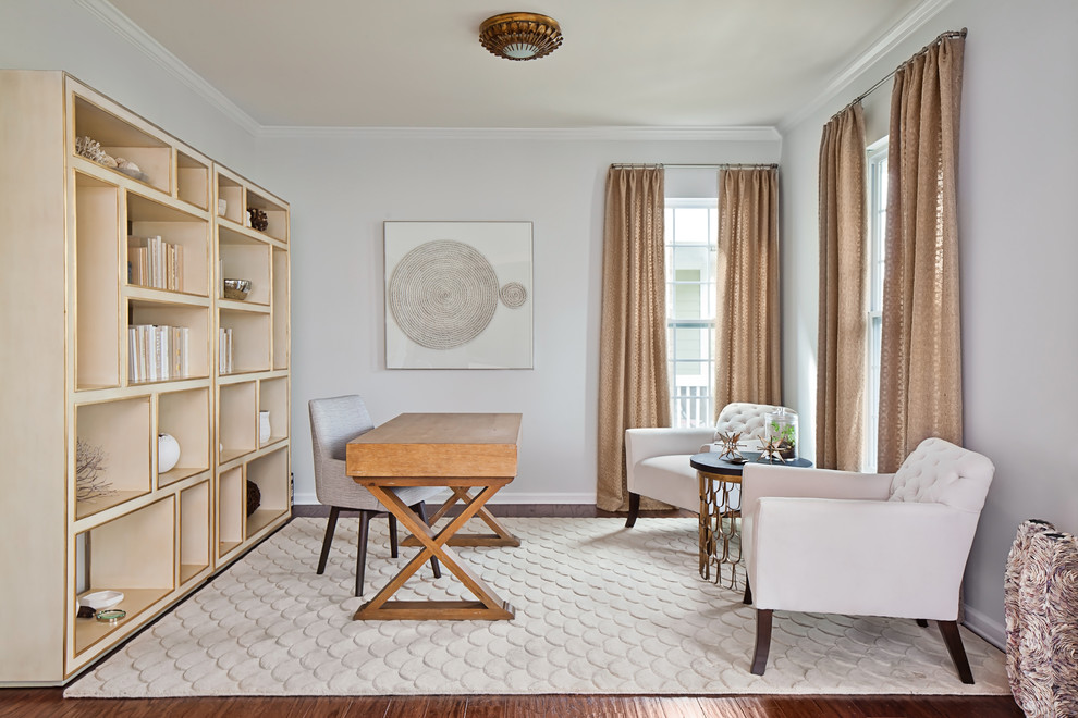 Inspiration for a transitional home office in Charlotte with grey walls and a freestanding desk.