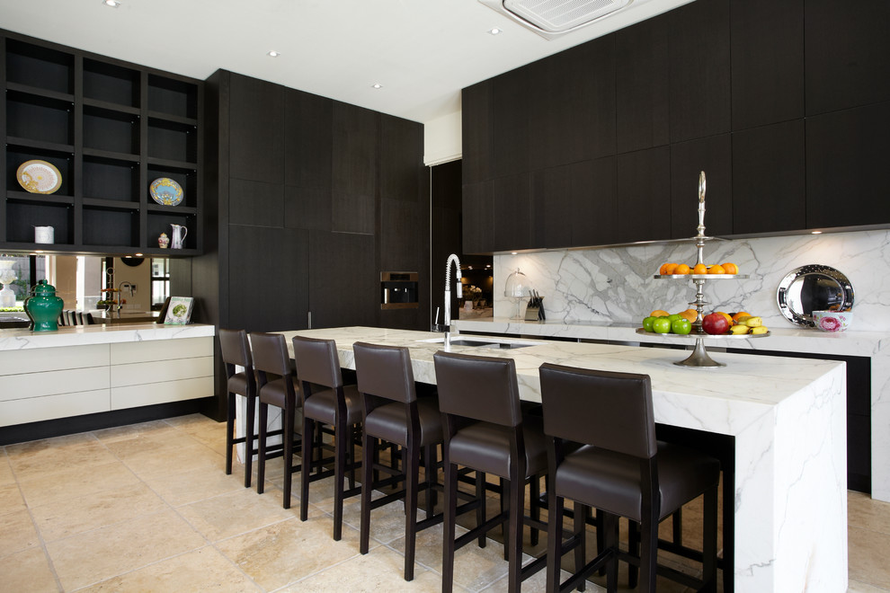 Design ideas for a contemporary kitchen in Melbourne with flat-panel cabinets, marble benchtops, white splashback, travertine floors and marble splashback.